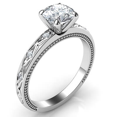 Leaf motif vintage style engagement ring with side diamonds