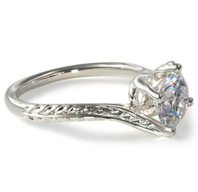 Vintage style wheet motif solitaire engagement ring