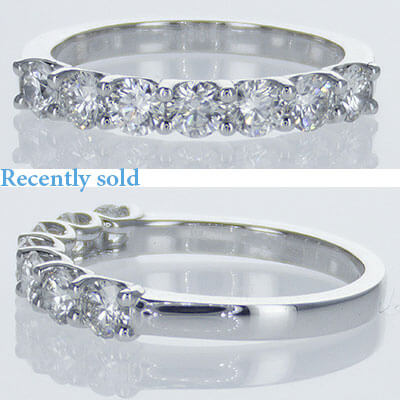 0.90 quilates anillo flotante de 7 diamantes
