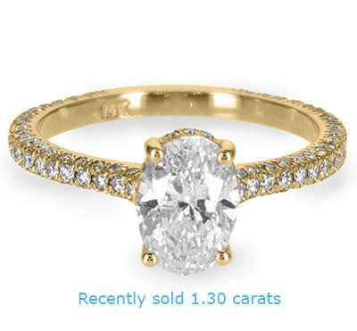 Oval hidden halo engagement ring