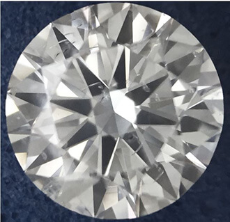 Foto 1.00 quilates, diamante redondo con excelente corte, color J, claridad I1 y certificado por GIA de