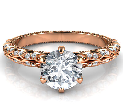 Anillo de compromiso de oro rosa con hojas engastadas con diamantes, estilo vintage