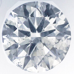 Foto 0,73 quilates, diamante redondo con talla ideal, color E, claridad SI2 y certificado por IGL de