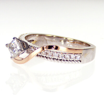 Bespoke custom engagement ring with 0.27 carat side diamonds