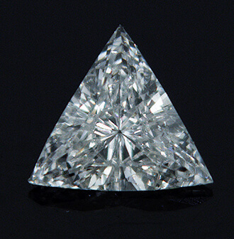 Foto Diamante triangular de 0,15 quilates con muy buen corte, color G, claridad VS2 y certificado por CGL de