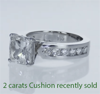  Anillo de compromiso, diamantes laterales de 0,50 Ct.