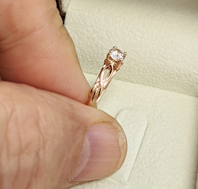 , 0.25 quilates anillo de compromiso con solitario infinito con motivo de hoja