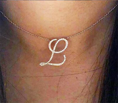 Letter pendant with 1/2 carat high quality diamonds G  VS2