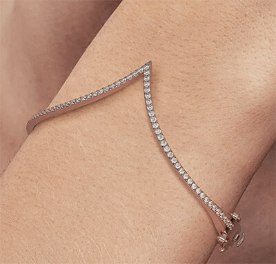 0.90 carat V shaped bangle in 14k Gold, White, Rose or Yellow colors.