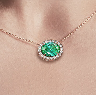 Colgante de esmeralda ovalada de 1 1/4 quilates y diamantes de 1/5 quilates