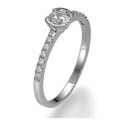 Petit half bezel engagement ring