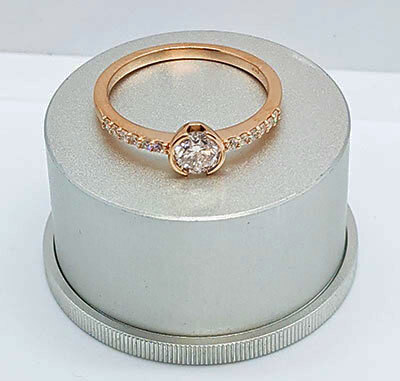 Petit half bezel engagement ring