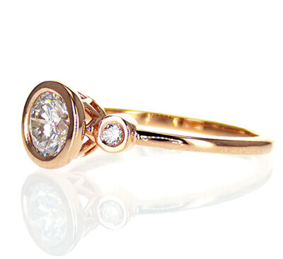 Bezel set Engagement ring with side diamonds, tailored to your chosen diamond