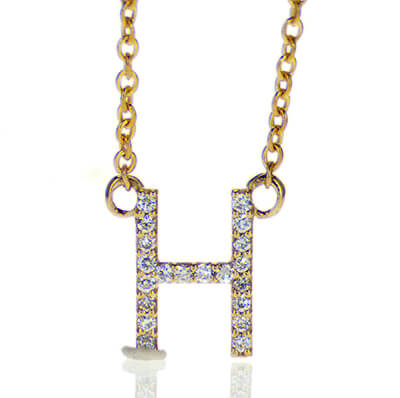 Initial letter encrusted with 0.10 to 0.14 carat diamonds, in 14k Gold, White, Yellow or Rose color