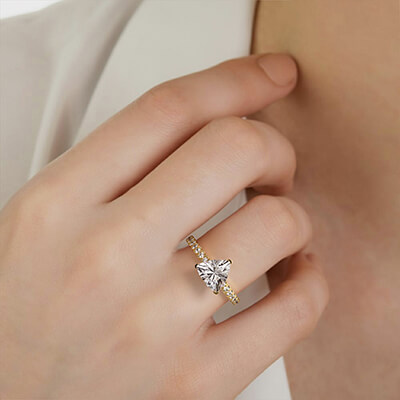 Trillion cut diamond engagement ring set with 0.22 carats side stones