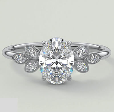 Low Profile Marquise center engagement ring with 0.60 carat Marquise side diamonds