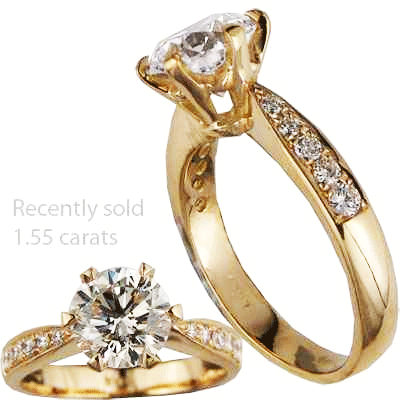 Designers engagement ring with round diamonds