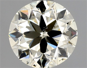 Picture of Natural Diamond 0.90 Carats, Round with Very Good Cut, N Color, SI1 Clarity and Certified by GIA