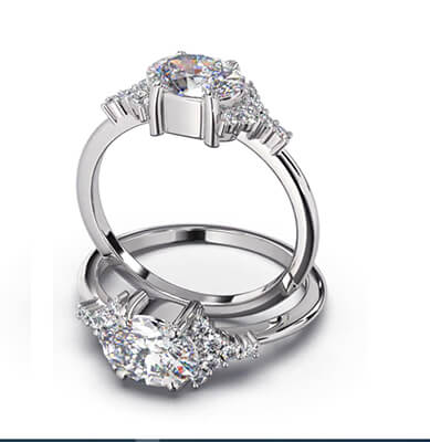 Side ways Oval diamonds engagement ring