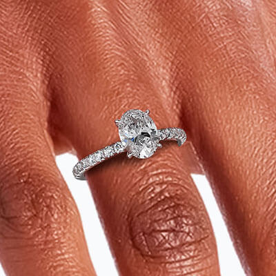 Oval engagement ring with side diamonds