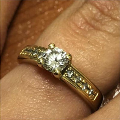 0.30 carat center with side diamonds