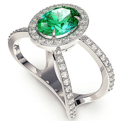 1.20 Emerald  Oval shape, X ring set with 1/2 carat side natural diamonds  average G VS