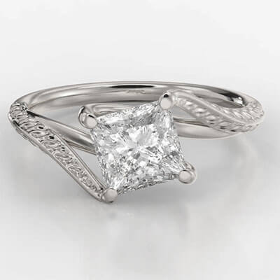 Vintage style wheet motif solitaire engagement ring