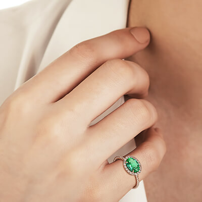 11/4 carat Oval Emerald and 1/5 carat round diamonds