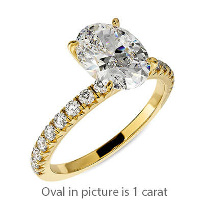 Oval engagement ring with side diamonds