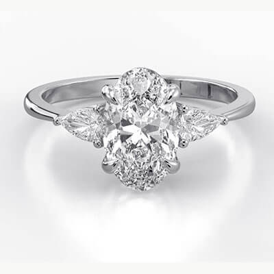 Three stone engagement ring with 0.20CTW side Pear diamonds