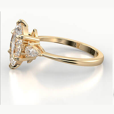 Three stone engagement ring with 0.20CTW side Pear diamonds