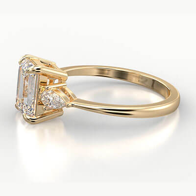 Three stone engagement ring with 0.20CTW side Pear diamonds