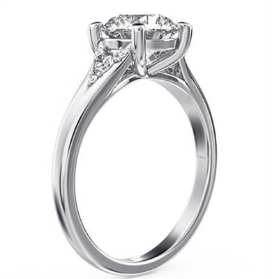 Round diamond engagement ring with split band and side diamonds