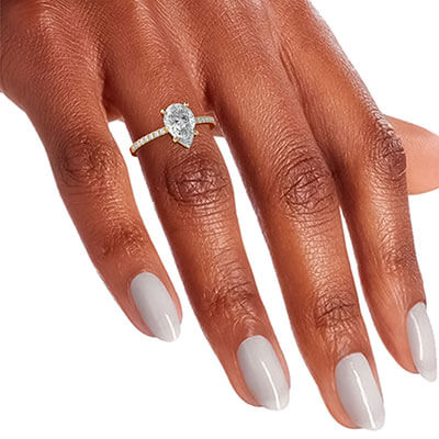 Low profile pear shaped diamond engagement ring