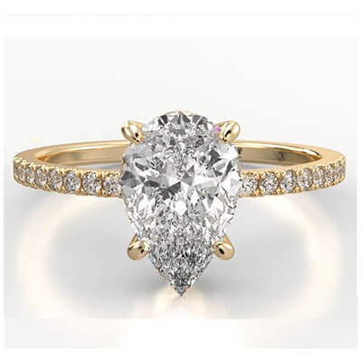 Low profile pear shaped diamond engagement ring