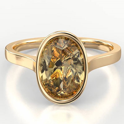 2.05 natural diamond. Fancy Brown Yellow SI2 by GIA oval set only in 18k Yellow - 14K White Gold