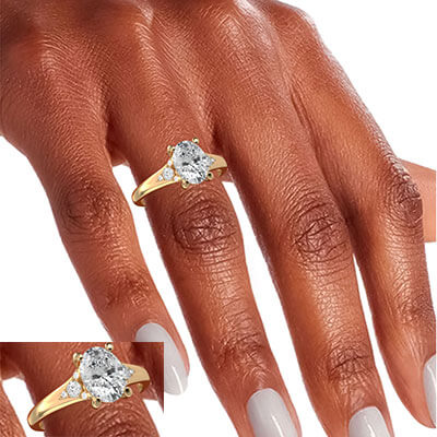 Anillo de compromiso ovalado en oro amarillo con banda dividida y diamantes laterales