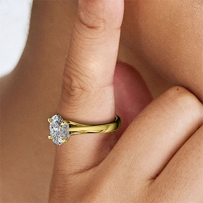 Gold engagement ring. Buddies cathedral solitaire engagement ring settings for Ovals, Radiants and Emeralds