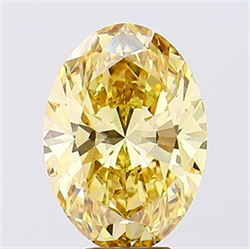 Picture of Lab Grown Diamond 6.30 Carats, Oval with  Cut, Fancy Vivid Yellow Color, VVS2 Clarity and Certified by IGI