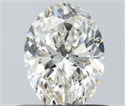 Natural Diamond 0.60 Carats, Oval with  Cut, H Color, SI1 Clarity and Certified by IGI