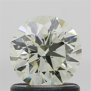 Foto Diamante Natural 0.90 quilates, Redondo , Color N, claridad VVS2 y certificado GIA de