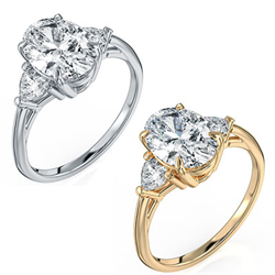 Picture of Three stone ring Oval center with 0.32 Carat total side Heart Lab diamonds F VVS2