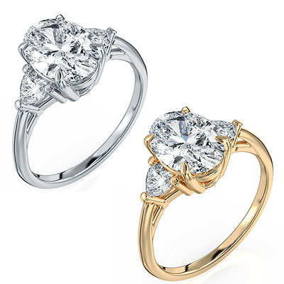 Three stone ring Oval center with 0.32 Carat total side Heart Lab diamonds F VVS2