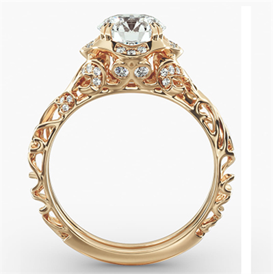 This delicate filigree vintage style engagement ring, 