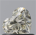 Natural Diamond 0.52 Carats, Heart with  Cut, M Color, IF Clarity and Certified by GIA