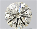 Natural Diamond 0.70 Carats, Round with Excellent Cut, K Color, VS2 Clarity and Certified by IGI