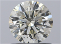 Natural Diamond 0.73 Carats, Round with Excellent Cut, J Color, SI1 Clarity and Certified by IGI