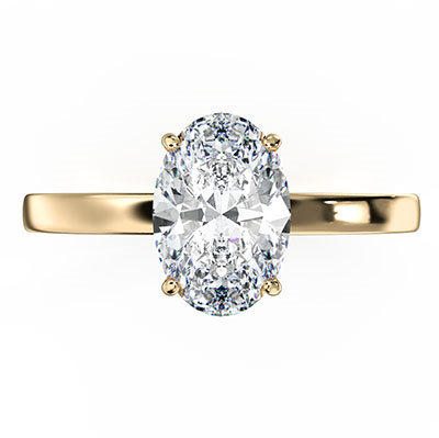 Solitaire engagement ring with hidden gold halo setting for all shapes