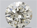 Natural Diamond 0.90 Carats, Round with Excellent Cut, J Color, SI1 Clarity and Certified by IGI