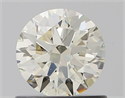 Natural Diamond 0.70 Carats, Round with Excellent Cut, K Color, VVS1 Clarity and Certified by IGI